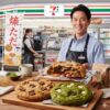 清潔なコンビニの店内で、制服を着て微笑む現役の日本人コンビニ店長。記事の専門性と権威性を示しています。